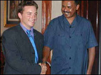 BBC's Jonah Fisher and President Isaias Afewerki shaking hands